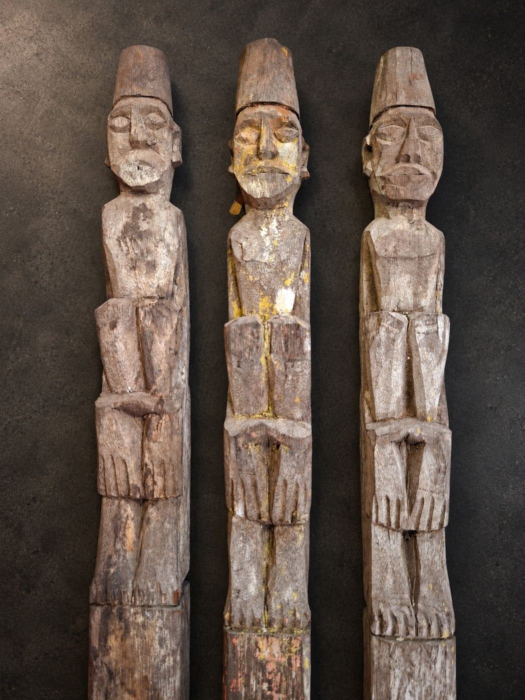 The Lamin Assembly, weathered carved wood with surviving pigment traces; custom powder-coated iron mounts, shown complete