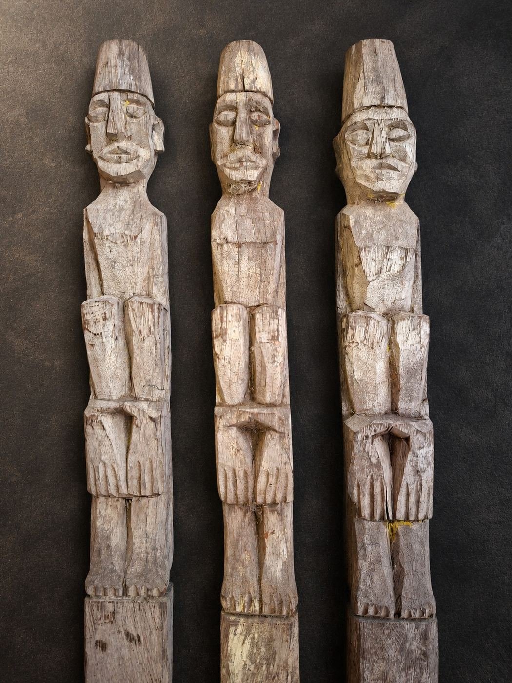 The Lamin Assembly, weathered carved wood with surviving pigment traces; custom powder-coated iron mounts, shown complete